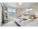 Cozy bedroom with large window and light walls at 12740 Tamarac St, Thornton, CO 80602