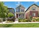 Charming two-story home with a cozy front porch and well-maintained landscaping at 12740 Tamarac St, Thornton, CO 80602