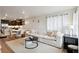 Open living area with seamless flow to the kitchen and dining space at 12740 Tamarac St, Thornton, CO 80602