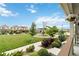 Lovely view from a porch showcasing the community playground, lush greenery, and homes at 12740 Tamarac St, Thornton, CO 80602