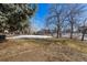 Large backyard offering plenty of space for outdoor activities and landscaping opportunities at 2290 S Braun Way, Lakewood, CO 80228