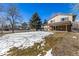 Spacious backyard featuring a covered patio perfect for outdoor relaxation and entertainment at 2290 S Braun Way, Lakewood, CO 80228