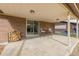 Outdoor patio with wood burning stove, furniture set, and a brick design for an inviting retreat at 2290 S Braun Way, Lakewood, CO 80228