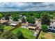Aerial view of the property with solar panels and fenced yard at 7936 Eaton St, Arvada, CO 80003
