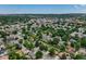 Wide aerial view of the neighborhood highlighting the well-maintained homes and mature trees at 7936 Eaton St, Arvada, CO 80003