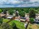 Aerial view of a fenced-in backyard with solar panels, shed, trampoline and green grass at 7936 Eaton St, Arvada, CO 80003