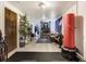 Finished basement showcasing ample living space, wood-look flooring, and unique decor at 7936 Eaton St, Arvada, CO 80003