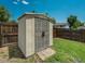 Durable outdoor shed with double doors for convenient storage in the backyard at 7936 Eaton St, Arvada, CO 80003