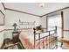 Bright bedroom featuring vintage brass bed frame, natural light, and antique furnishings at 1918 Virginia St, Idaho Springs, CO 80452