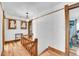 Hallway with hardwood floors and natural wood trim at 1918 Virginia St, Idaho Springs, CO 80452