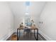 Home office space with a skylight, desk, chair, and decor at 1562 Madison St, Denver, CO 80206