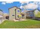 Backyard with outdoor patio seating area, blending relaxation with backyard enjoyment at 5207 S Jericho Way, Centennial, CO 80015