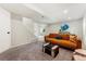 Inviting basement with comfortable seating and decor, ideal for Gathering gatherings and relaxation at 5207 S Jericho Way, Centennial, CO 80015