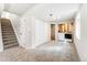 Functional basement area with stairs, closets, and laundry appliances, designed for convenience at 5207 S Jericho Way, Centennial, CO 80015