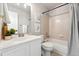 Bathroom featuring a tub with shower, vanity, and toilet at 5207 S Jericho Way, Centennial, CO 80015