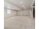 Spacious unfinished basement with carpeting, white walls, recessed lighting and a staircase at 6384 E 154Th Pl, Thornton, CO 80602