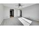 Empty bedroom with carpet, ceiling fan, and closet at 7511 S Sicily Way, Aurora, CO 80016