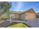 Well-maintained exterior with a manicured lawn and inviting curb appeal at 7511 S Sicily Way, Aurora, CO 80016