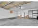 Spacious garage with ample storage space for vehicles and equipment at 7511 S Sicily Way, Aurora, CO 80016