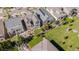 Aerial view of the property showcasing the backyard patio, artificial turf, and the neighborhood at 18875 W 93Rd Ave, Arvada, CO 80007