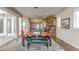 Dining area boasts an open layout, access to outdoor area, and seamless flow into the kitchen at 18875 W 93Rd Ave, Arvada, CO 80007