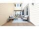 Private outdoor patio area is perfect for relaxing or entertaining with stylish outdoor seating at 18875 W 93Rd Ave, Arvada, CO 80007