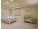 Bright bedroom with a pink and white color scheme, and vintage furniture at 5 Redhawk Run, Cherry Hills Village, CO 80113