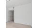Neutral colored empty bedroom with two doors at 3855 Canyon Ranch Rd # 104, Highlands Ranch, CO 80126