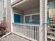 Covered patio area with stairs at 3855 Canyon Ranch Rd # 104, Highlands Ranch, CO 80126