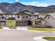 Two-story home with manicured front yard and mountain views at 3187 S Quaker St, Morrison, CO 80465