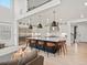 Open concept kitchen with a large island and stainless steel appliances at 3187 S Quaker St, Morrison, CO 80465