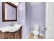 Cozy bathroom has vanity with sink and tile flooring at 1303 S Danube Way # 104, Aurora, CO 80017