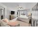 Spacious bedroom with large windows offering plenty of natural light at 1303 S Danube Way # 104, Aurora, CO 80017
