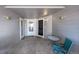 Front patio area shows townhome entrances with exterior lighting at 1303 S Danube Way # 104, Aurora, CO 80017