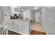Kitchen showcasing granite countertops, stainless appliances, and bar seating area at 1303 S Danube Way # 104, Aurora, CO 80017