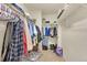 Well-organized walk-in closet with ample storage space and shelving at 1303 S Danube Way # 104, Aurora, CO 80017