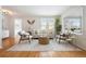 Bright and inviting living room with modern furnishings and natural lighting at 2482 Otis Ct, Edgewater, CO 80214