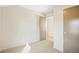 A serene bedroom featuring neutral walls, carpet, and modern doors, creating a calming space at 1415 Irving St, Denver, CO 80204