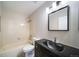 Clean bathroom with a shower/tub combo and updated vanity at 12093 W Cross Dr # 206, Littleton, CO 80127