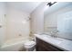 Bathroom with tub, toilet and vanity at 12093 W Cross Dr # 206, Littleton, CO 80127