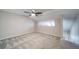 Loft bedroom with carpet, ceiling fan, and skylight at 12093 W Cross Dr # 206, Littleton, CO 80127