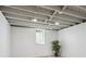 Finished basement featuring an exposed ceiling at 1852 S Decatur St, Denver, CO 80219