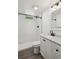 Modern bathroom with a subway tile shower and sleek vanity at 1852 S Decatur St, Denver, CO 80219