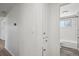 Bright bathroom featuring subway tile shower and modern fixtures at 1852 S Decatur St, Denver, CO 80219