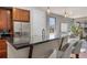 Kitchen island with barstool seating and open floor plan at 2053 Meade St, Denver, CO 80211