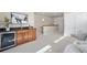 Living room featuring a wet bar and a mini fridge along with a sofa at 2053 Meade St, Denver, CO 80211