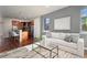Comfortable living room area with stylish decor and eat-in kitchen at 2053 Meade St, Denver, CO 80211