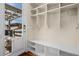 Functional mudroom with built-in storage cubbies, hooks, and a convenient bench seat at 2053 Meade St, Denver, CO 80211