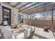 Outdoor patio area with pergola and stylish seating arrangements at 2053 Meade St, Denver, CO 80211