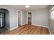 The living room offers hardwood floors and neutral paint throughout at 1545 N Harrison St, Denver, CO 80206